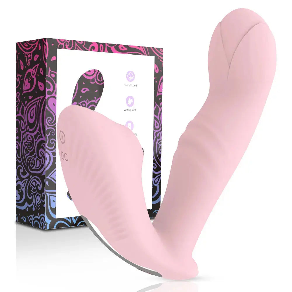 Ainio365 Pink Wearable Suction Vibrator Massager shown next to its purple and black paisley gift box, featuring a curved ergonomic design for dual stimulation.