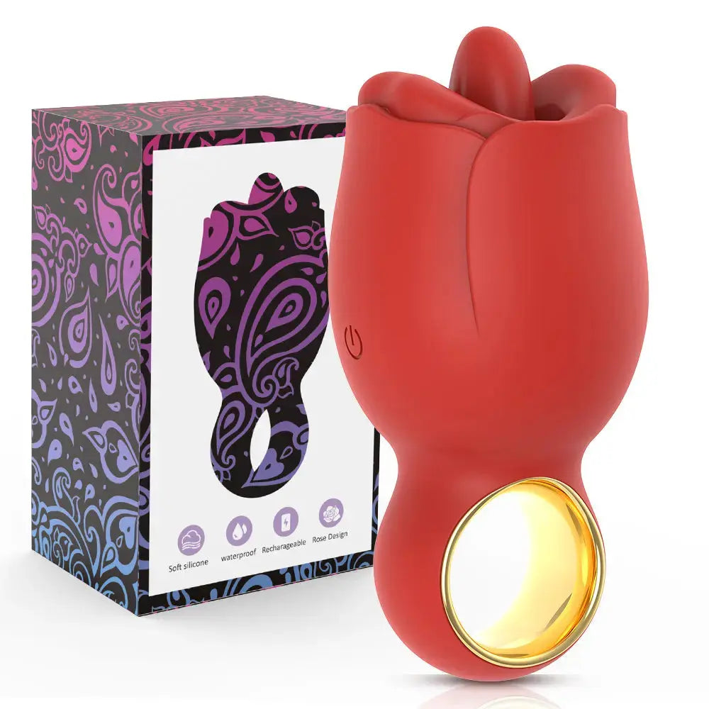 Red AINIO Mini Honey Attracting Rose Vibrator with a gold-trimmed closed loop for ergonomic grip. Showcased next to its purple and black paisley patterned packaging on a white background.